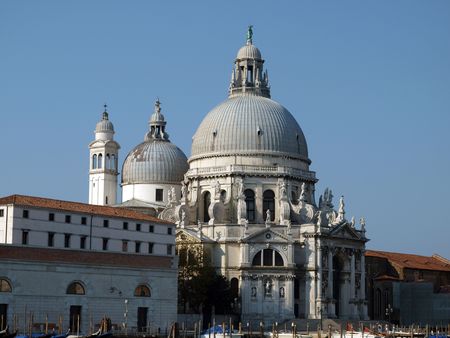 Basilica di Santa Maria Della Salute - Venice, Italy. Santa Maria Della Salute was built as a thanks or offering to the Virgin Mary against he plague which had taken almost a third of the Venice's population in 1630.の写真素材
