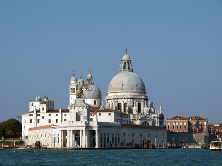 Basilica di Santa Maria Della Salute - Venice, Italy. Santa Maria Della Salute was built as a thanks or offering to the Virgin Mary against he plague which had taken almost a third of the Venice's population in 1630.の写真素材