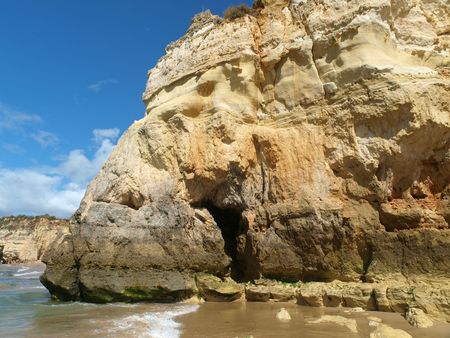 A section of the idyllic Praia de Rocha beach on the southern coast of the Portuguese Algarve region. の写真素材