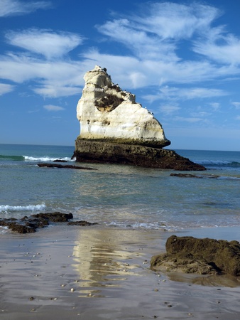 A lonely rock in the ocean. The effect of erosionの写真素材