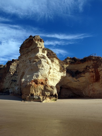 Colourful rocks and wonderful sands on the Algarve coast in Portugal の写真素材