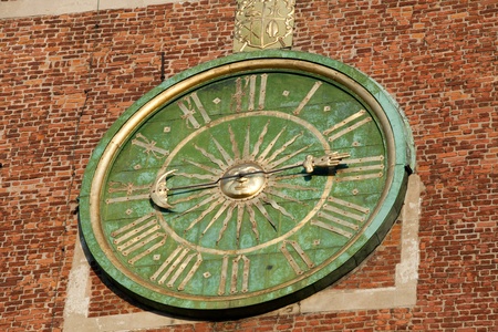 Krakow - clock face on the tower of the cathedral of WawelKrakow - clock face on the tower of the...