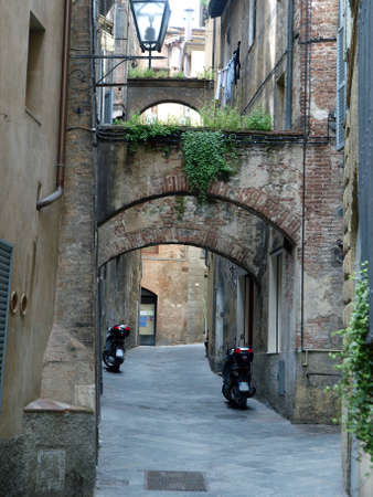 Picturesque street in antique center Siena, Tuscany, Italyのeditorial素材