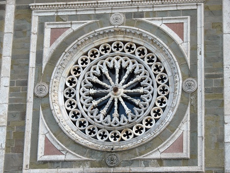 Rose window on the facade of the church of St. Margaret of Cortona