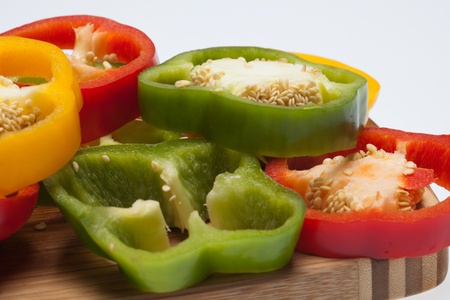 close up of red, yellow and green peppers