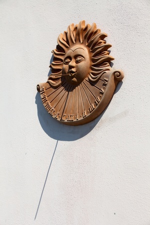 Old sundial in a rural building.