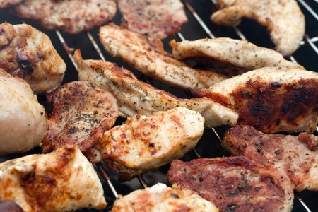 barbecue with delicious grilled meat on grillの写真素材