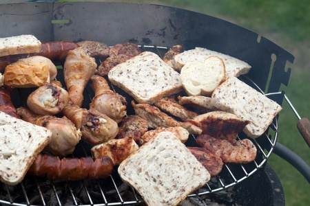 barbecue with delicious grilled meat on grillの写真素材