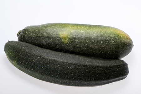 Fresh vegetable courgette. Isolated on white の写真素材