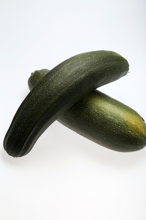 Fresh vegetable courgette. Isolated on white の写真素材