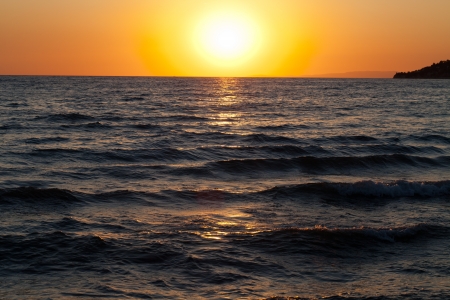 Sunset over the sea の写真素材