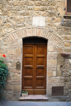 wooden residential doorway in Tuscany. Italy の写真素材