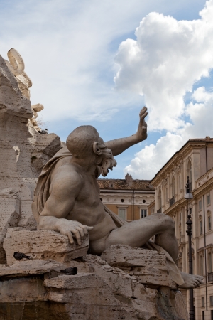 tThe Fountain of the Four Rivers -  Piazza Navona, Rome, Italy .The displacement of cloudsの写真素材
