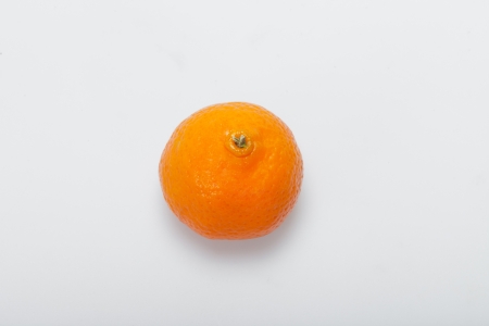 fresh mandarin isolated on whiteの写真素材