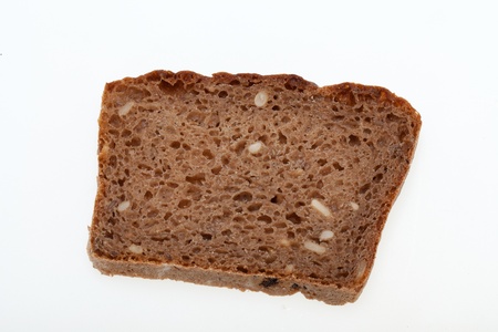 Slice of dark bread isolated over white 