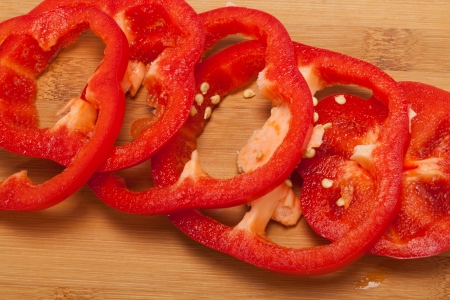 Sliced red pepper isolated on white backgroundの写真素材
