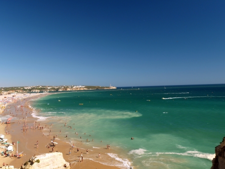 A section of the idyllic Praia de Rocha beach on the Algarve region. の写真素材