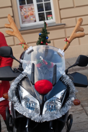 The parade of Santa Clauses on motorcycles around the Main Market Square in Cracowの写真素材