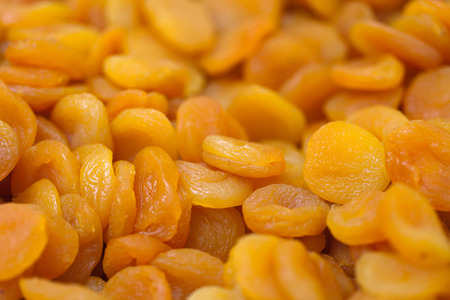 Heap of dried apricots close-up. 