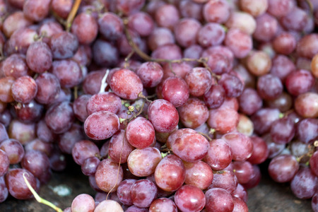 Red grapes on sale at the local farmers market.