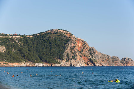 castle of Alanya built on rocks and beach of Cleopatra, Antalya, Turkey のeditorial素材