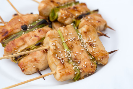 barbecue with delicious grilled meat and leek の写真素材