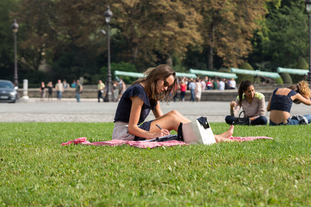 People resting in the park near main entrance Les Invalides. Paris, Franceのeditorial素材