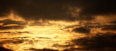 Sunset with beautiful golden skyの写真素材