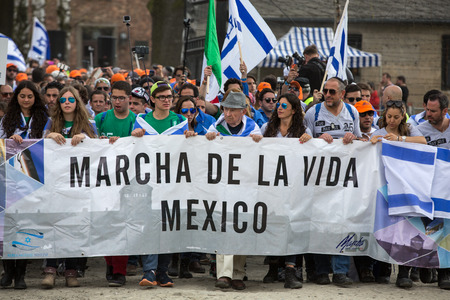 OSWIECIM, POLAND - APRIL 16, 2015:the next generation of people from the all the world meets on the March of the Living in german Concentration Camp in Auschwitz Birkenau.Polandのeditorial素材