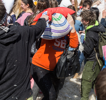 KRAKOW, POLAND - APRIL 11, 2015:  International pillow fight on April 11, 2015 in Old Market Square in Cracow. Polandのeditorial素材