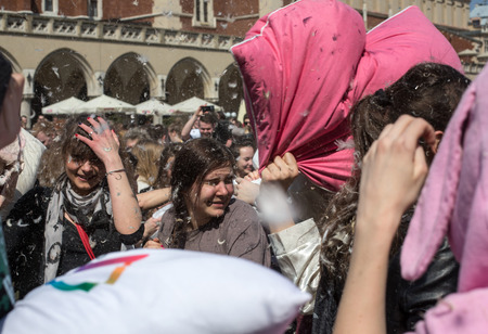 KRAKOW, POLAND - APRIL 11, 2015:  International pillow fight on April 11, 2015 in Old Market Square in Cracow. Polandのeditorial素材