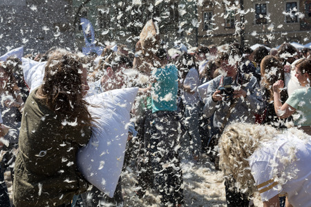 KRAKOW, POLAND - APRIL 11, 2015:  International pillow fight on April 11, 2015 in Old Market Square in Cracow. Polandのeditorial素材