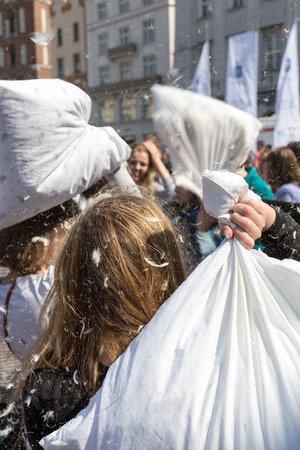 KRAKOW, POLAND - APRIL 11, 2015:  International pillow fight on April 11, 2015 in Old Market Square in Cracow. Polandのeditorial素材