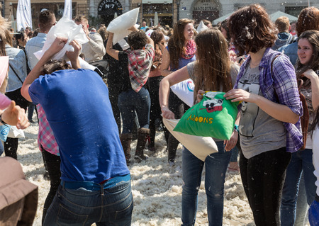 KRAKOW, POLAND - APRIL 11, 2015:  International pillow fight on April 11, 2015 in Old Market Square in Cracow. Polandのeditorial素材