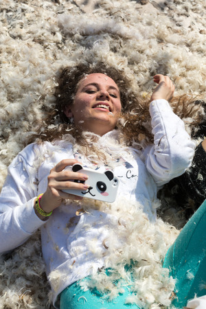 KRAKOW, POLAND - APRIL 11, 2015:  International pillow fight on April 11, 2015 in Old Market Square in Cracow. Polandのeditorial素材