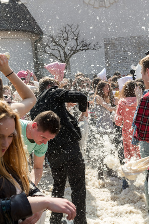 KRAKOW, POLAND - APRIL 11, 2015:  International pillow fight on April 11, 2015 in Old Market Square in Cracow. Polandのeditorial素材