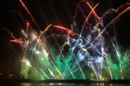 KRAKOW, POLAND - MAY 30, 2015: Yearly Great Dragons Parade connected with the fireworks display, taking place on the river Vistula at Wawel. Cracow , Polandのeditorial素材