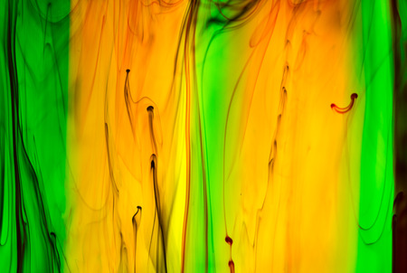 Acrylic colors and ink in water. Abstract background.の写真素材