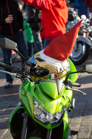CRACOW, POLAND - DECEMBER 6, 2015: the parade of Santa Clauses on motorcycles around the Main Market Square in Cracow. Polandのeditorial素材