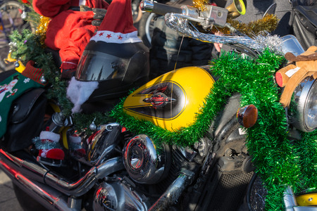 CRACOW, POLAND - DECEMBER 6, 2015: the parade of Santa Clauses on motorcycles around the Main Market Square in Cracow. Polandのeditorial素材