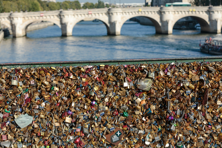 Paris, France - Pont   des Arts. Love padlocks on the bridge.   Passerelle des Arts is a pedestrian bridge in Paris which crosses the River Seineのeditorial素材