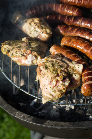 barbecue with delicious grilled meat on grill の写真素材