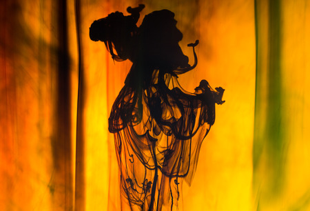 Acrylic colors and ink in water. Abstract background.の写真素材
