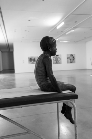 CRACOW, POLAND - APRIL 21, 2016: Cracow - MOCAK Museum of Contemporary Art. New exhibition - Medicine in Art. Sofie Muller - Tristan on a Bench 2007, sculptureのeditorial素材