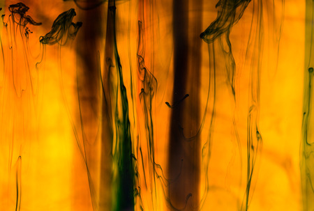 Acrylic colors and ink in water. Abstract background.の写真素材