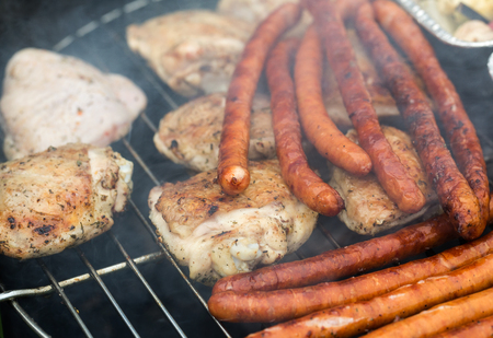 barbecue with delicious grilled meat on grillの写真素材