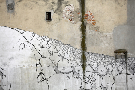 KRAKOW, POLAND - MARCH 29, 2016: Street art  in Podgorze district in Cracow,  Poland.  Podgorze is the perfect place to walk in the back alleys and abandoned areas, looking for  street artのeditorial素材