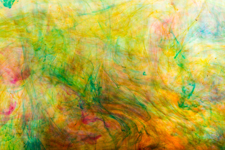 Acrylic colors and ink in water. Abstract background.