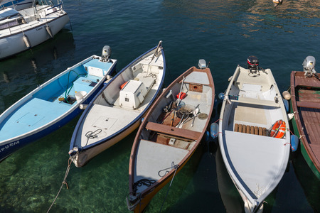 Fishing boats in the small harbor of Torri del Benaco. Garda Lake. Italyのeditorial素材