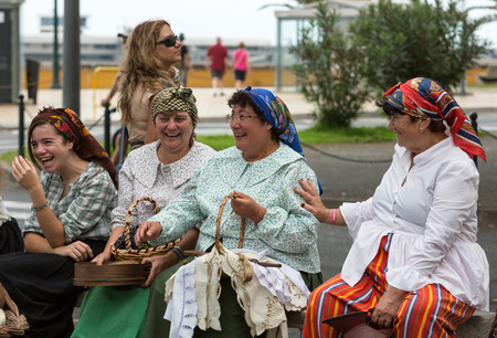 FUNCHAL, MADEIRA, PORTUGAL - SEPTEMBER 4, 2016: Group of women in traditional costume. Madeira Wine Festival - Historical and Ethnographic parade in Funchal on Madeira. Portugalのeditorial素材